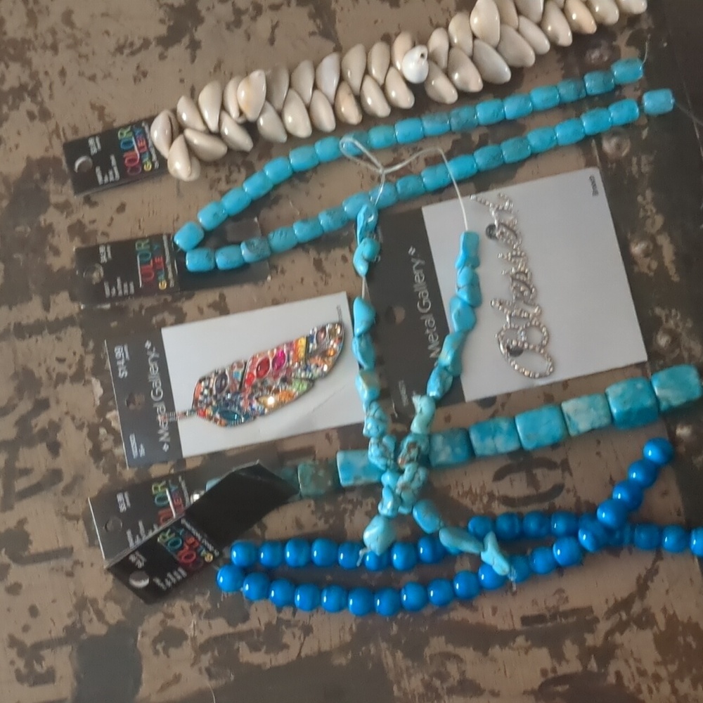 Glass Beads, cowrie shells, jasper, lil agates, and jewelry pendants